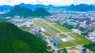 Điện Biên Phủ: Airport amidst scenic mountains.