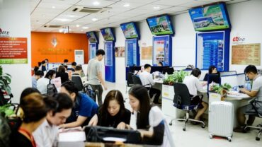 Travel agency in Hanoi assists customers with flight bookings.