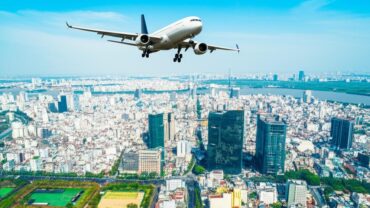 Ho Chi Minh City aerial view with airplane